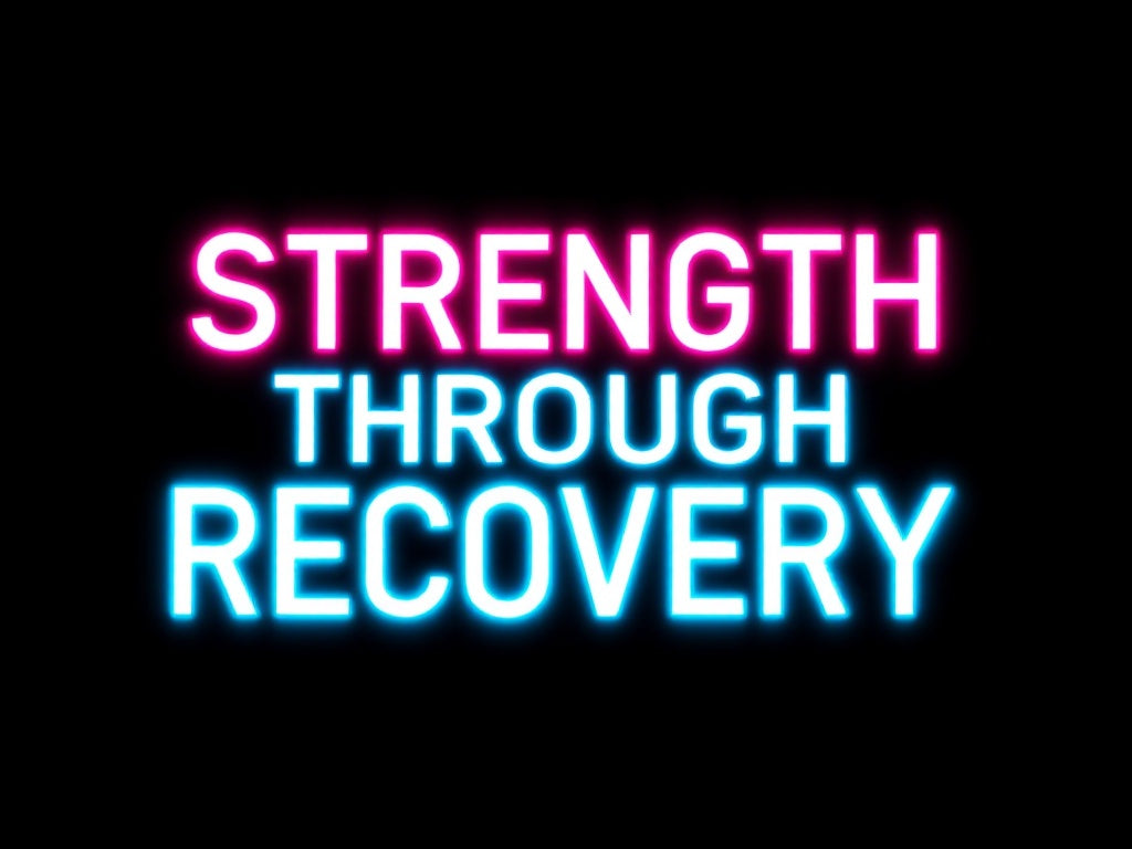 Motivational fitness quote in neon lights against black background. Text reads 'STRENGTH THROUGH RECOVERY' with 'STRENGTH' in hot pink neon and 'THROUGH RECOVERY' in electric blue neon.